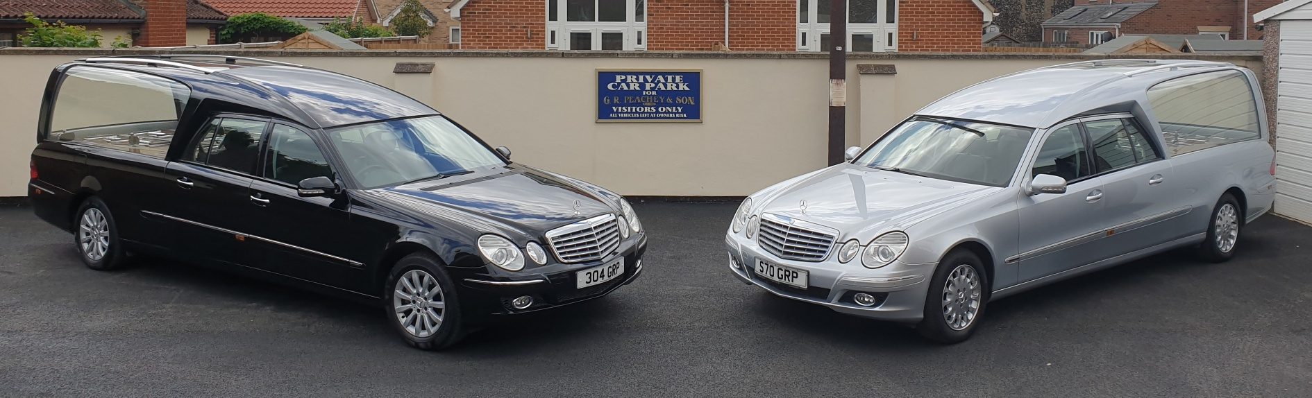 Black and silver hearses at our premises