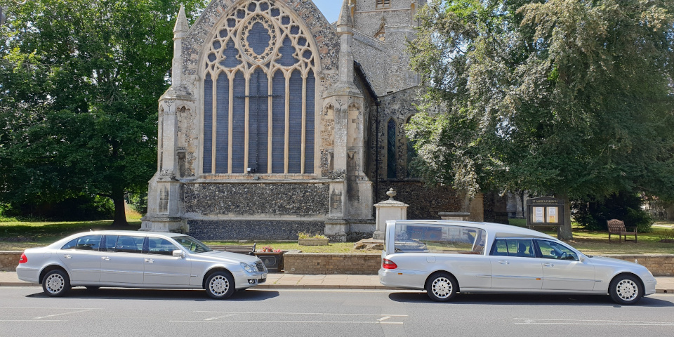 Silver vehicles outside St. Mary’s Church, Mildenhall